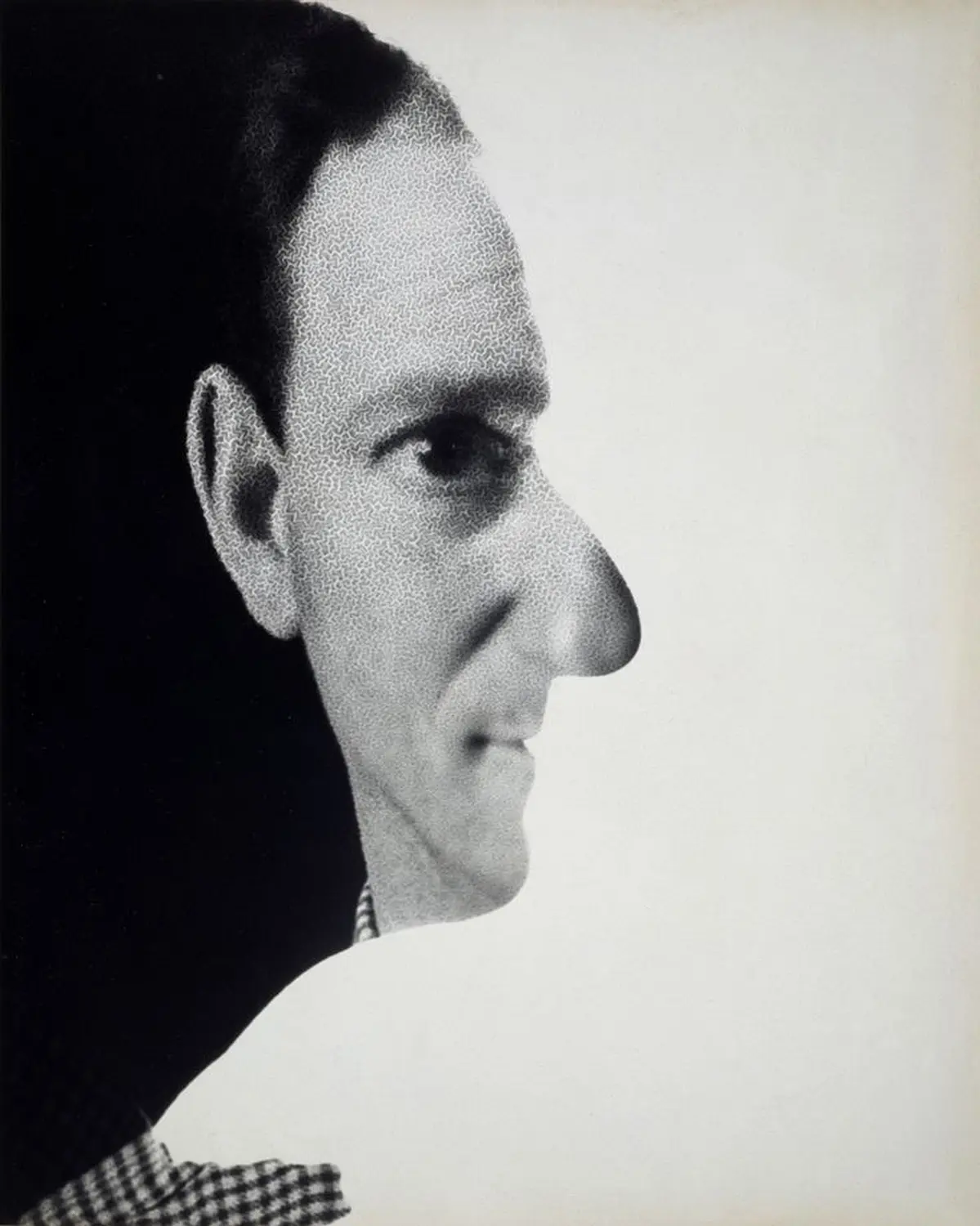 A portrait of the experimental photographer Erwin Blumenfeld.